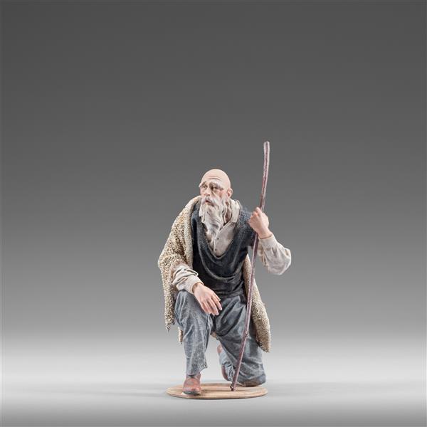 Hirte kniend mit Stock Hirte kniend mit Stock