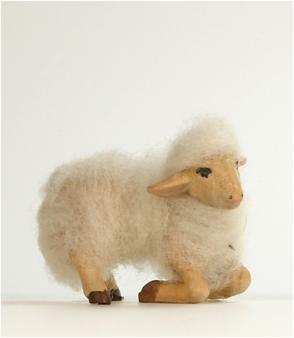 Lamm kniend