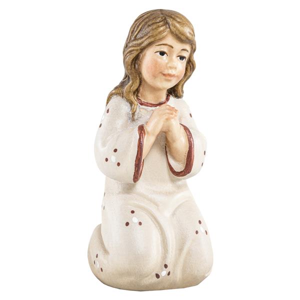 Mädchen kniend und betend