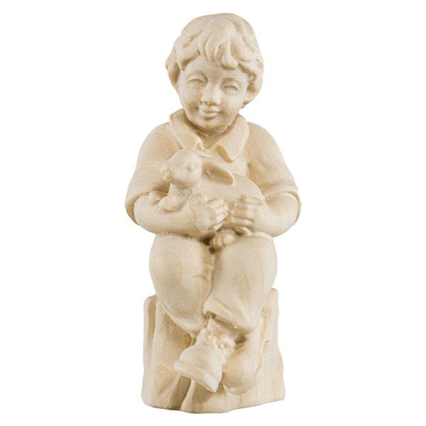 Junge sitzend mit Hase Junge sitzend mit Hase