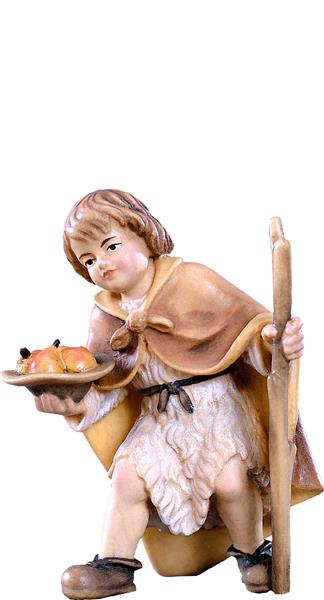 Junge mit Früchten