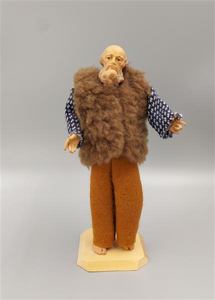 Hirt mit brauner Fellweste