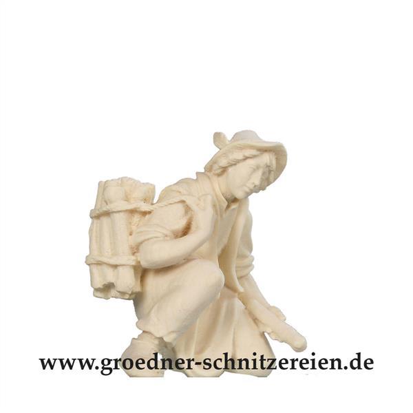 Hirt kniend mit Holz