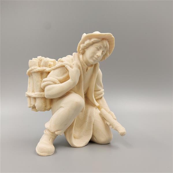 Hirt kniend mit Holz Hirt kniend mit Holz