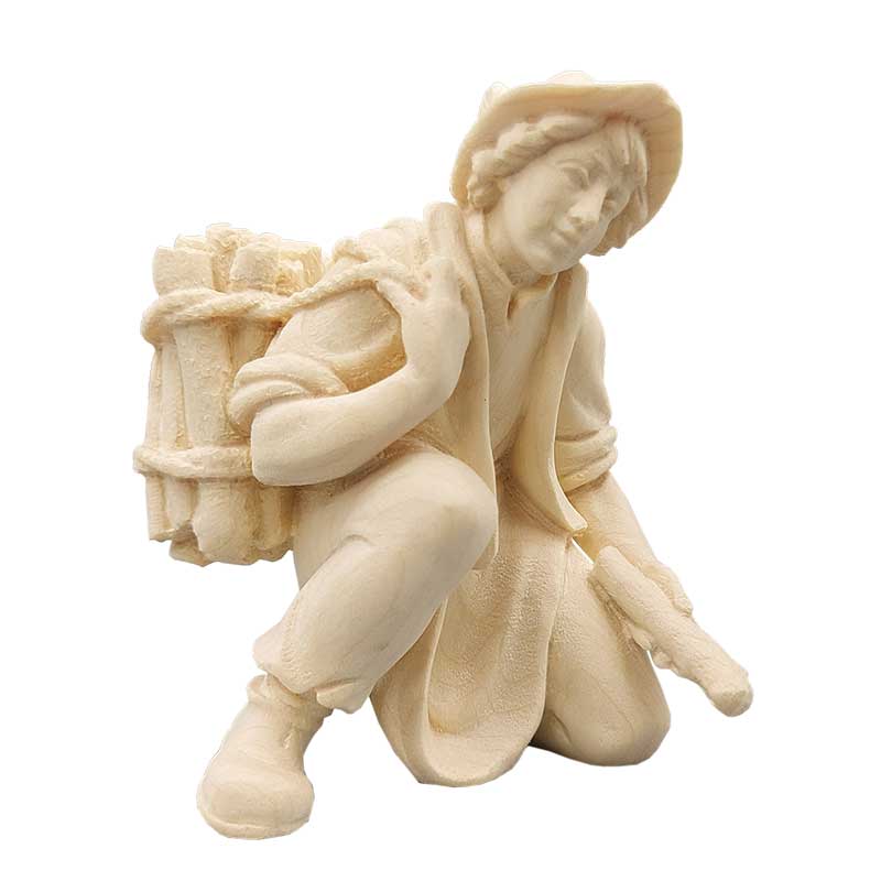 Hirt kniend mit Holz