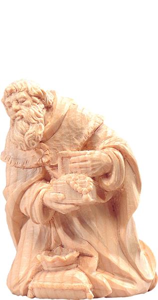 König Melchior kniend