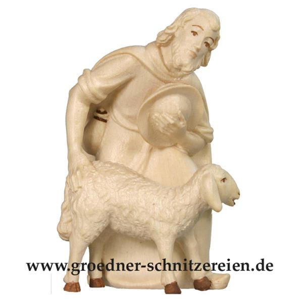 Hirt gebogen mit Schaf Hirt gebogen mit Schaf