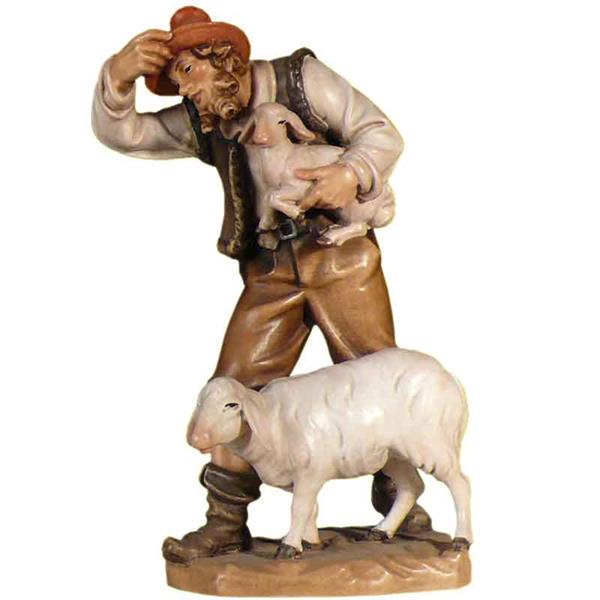 Hirte mit Schaf und Lamm