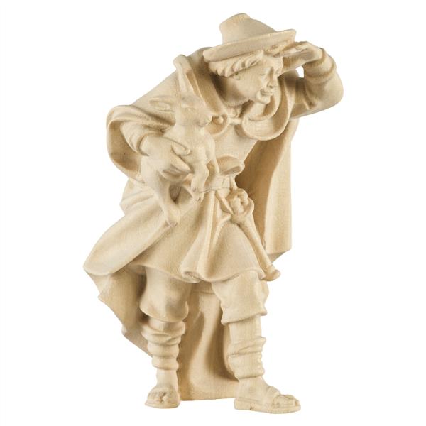 Hirt stehend und schauend mit Lamm auf Arm Hirt stehend und schauend mit Lamm auf Arm