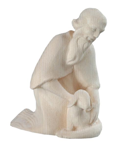 Hirte kniend mit Schaf Hirte kniend mit Schaf