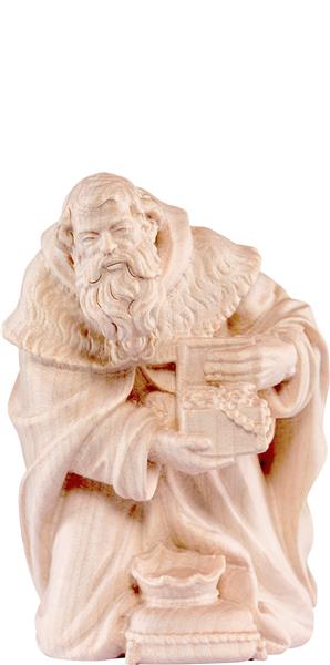 König Melchior kniend