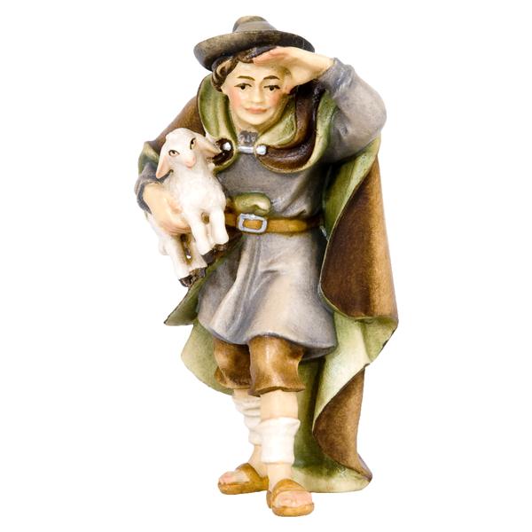 Hirt stehend und schauend mit Lamm auf Arm Hirt stehend und schauend mit Lamm auf Arm