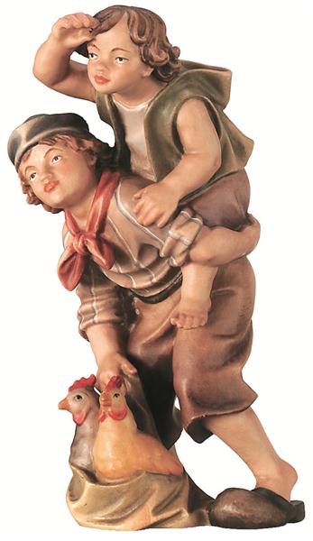 Buben schauend mit Hühner