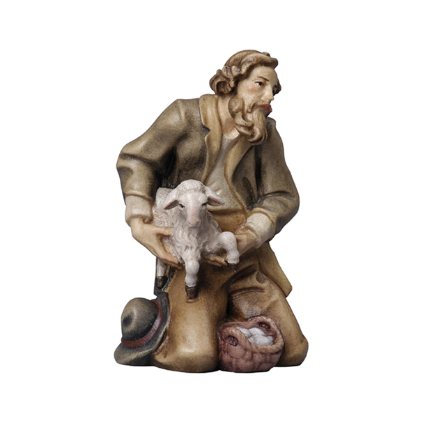 Hirte kniend mit Schaf Hirte kniend mit Schaf