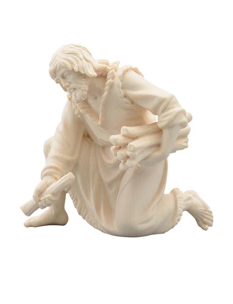 Hirt kniend mit Holz Hirt kniend mit Holz