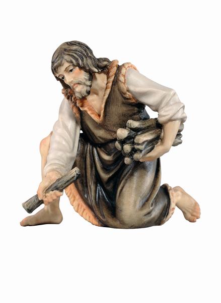 Hirt kniend mit Holz Hirt kniend mit Holz