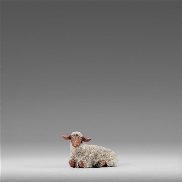 Schaf liegend mit Wolle grau