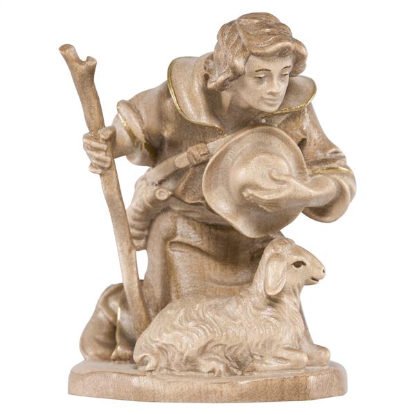 Hirt kniend mit Stock und Schaf Hirt kniend mit Stock und Schaf