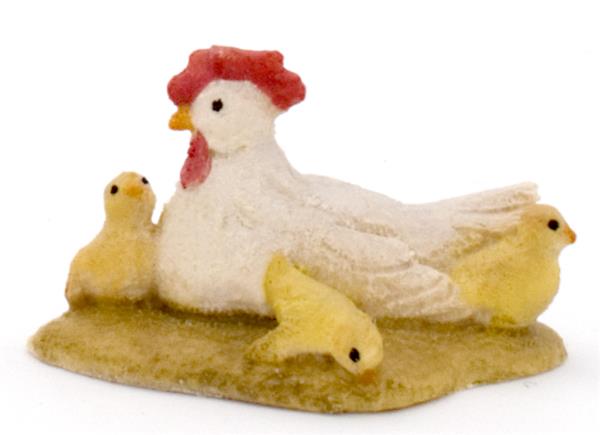 Henne liegend mit Küken