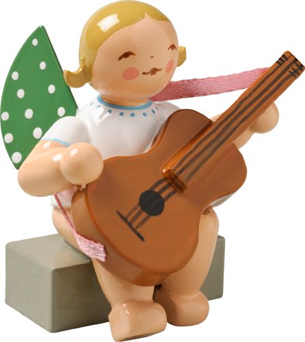 Engel mit Gitarre sitzend