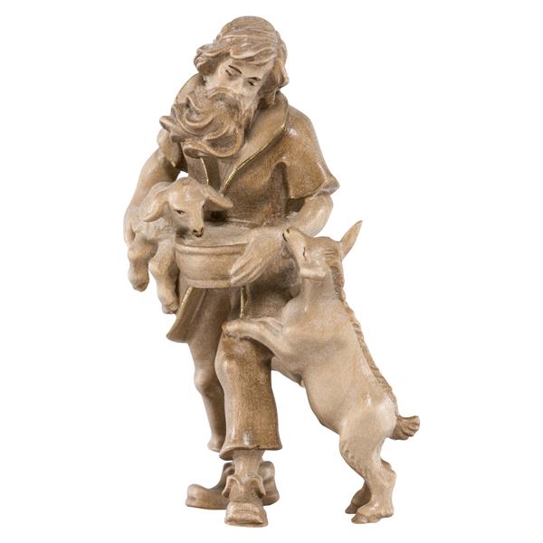 Hirt stehend mit Schaf und Ziege