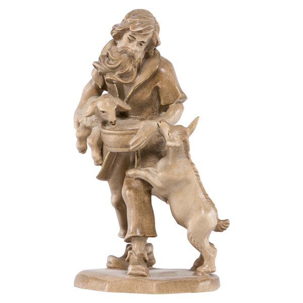 Hirt stehend mit Schaf und Ziege Hirt stehend mit Schaf und Ziege