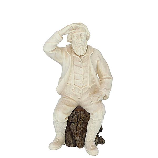 Bauer sitzt und schaut