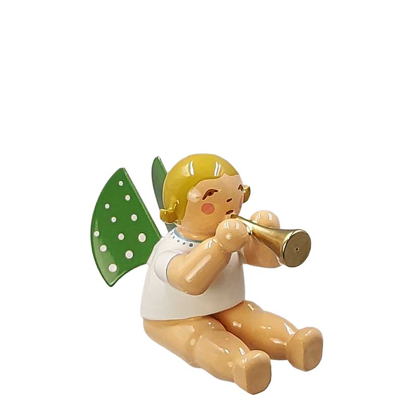 Engel mit Flöte sitzend