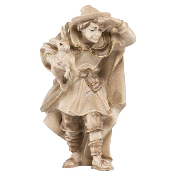 Hirt stehend und schauend mit Lamm auf Arm Hirt stehend und schauend mit Lamm auf Arm