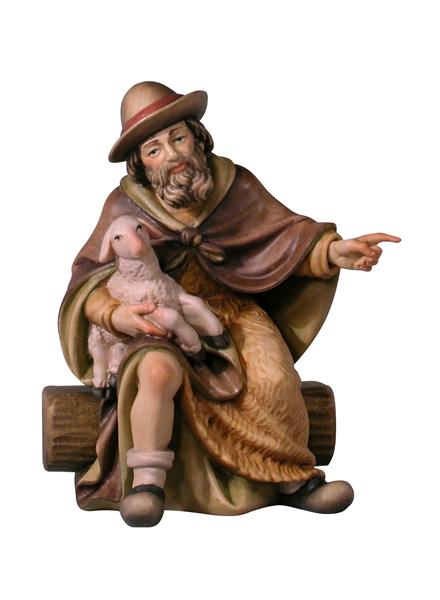 Hirt sitzend mit Bank Hirt sitzend mit Bank